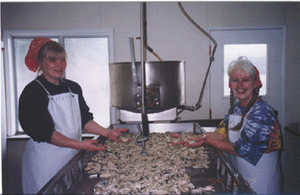 Marcie and Shirley cleaning oysters
